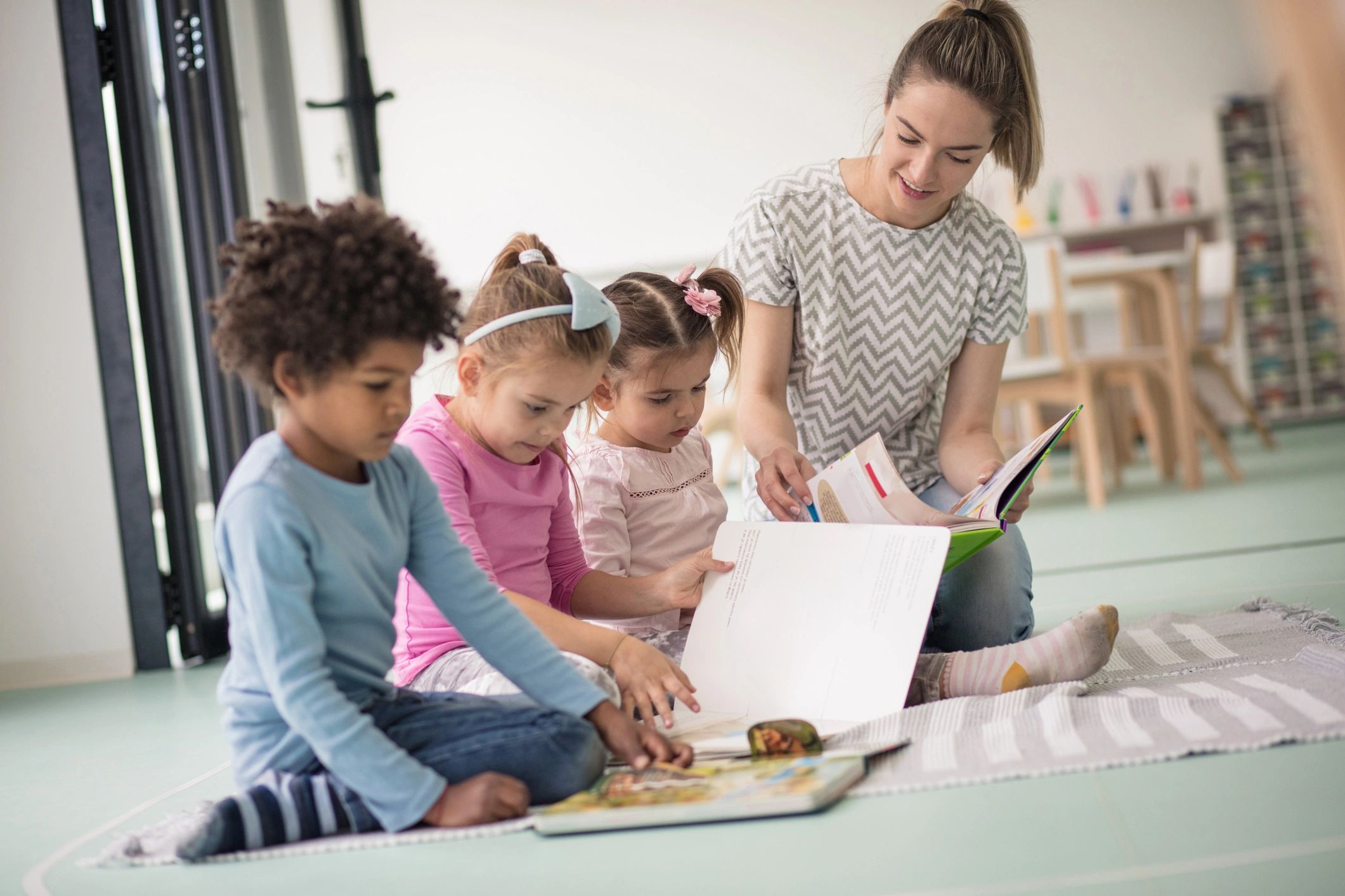 Children learning together in a warm preschool classroom